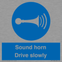 sound-horn-drive-slowly-warehousing-and-delivery-sign~